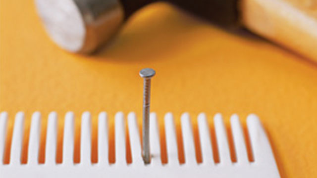 Use A Comb To Keep A Nail Steady For Hammering