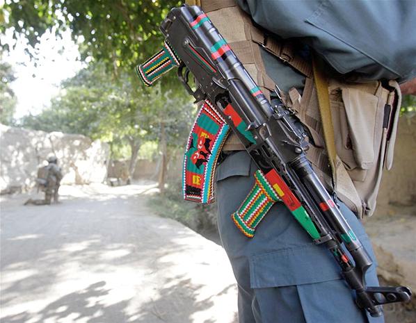 Weapon Decorated With Colourful Stickers